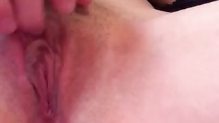 Young brunette playing with pussy