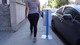 Candid Gorgeous blonde latina walking in leggings