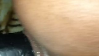 Tiny throwing it back on the strap