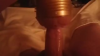 guy jerking off a huge dick and pouring himself with sperm