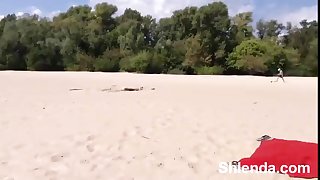 Beautiful babe with perfect sexy body on the nudist beach