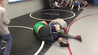 Mothers competitive wrestling in front of their Daughters