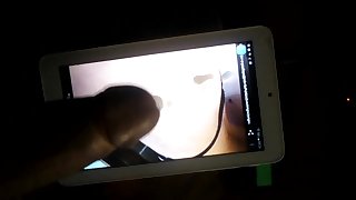 Jerks to her photos and cover them with cum