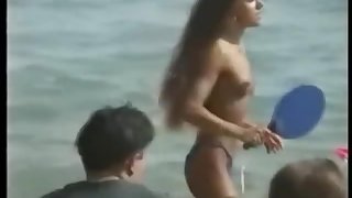 Alizee Jacotey topless playing paddle ball at Cannes