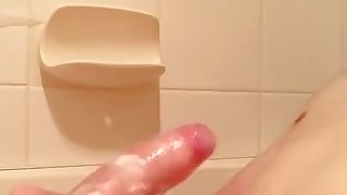 playing with my big white dick and balls in the bathtub