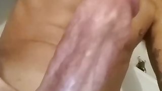 Young teen boy stroking his too big for his body cock