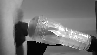 guy jerking off a huge dick and pouring himself with sperm