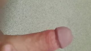 guy jerking off a huge dick and pouring himself with sperm