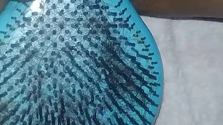 Slut with a brush squirts